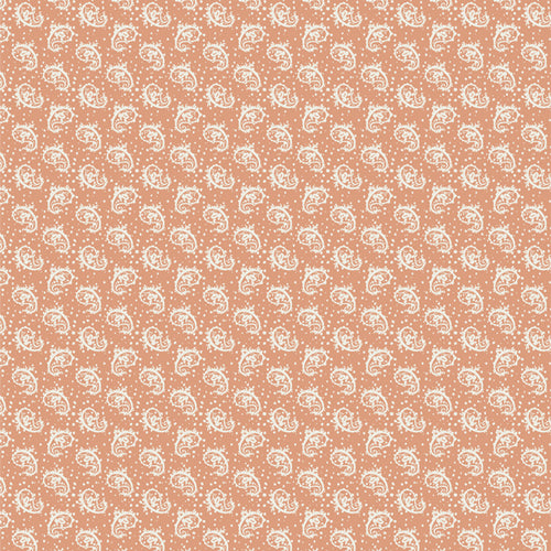 Fabric sold by Dolly Lou Fabrics, used for quilting. Patterned with pink paisley