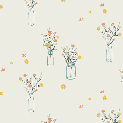 Fabric used for quiling sold by Dolly Lou Fabrics. Patterned with flowers in vases