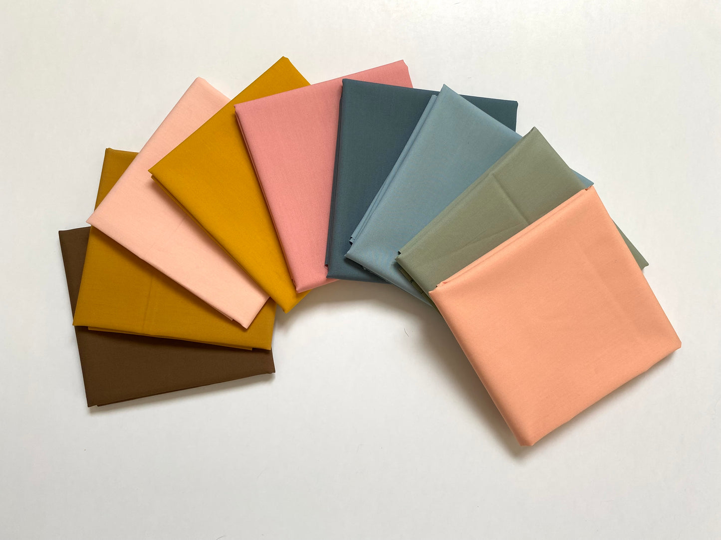 Fabric bundle in half yard pieces sold by Dolly Lou Fabrics. Art Gallery fabrics pure solids