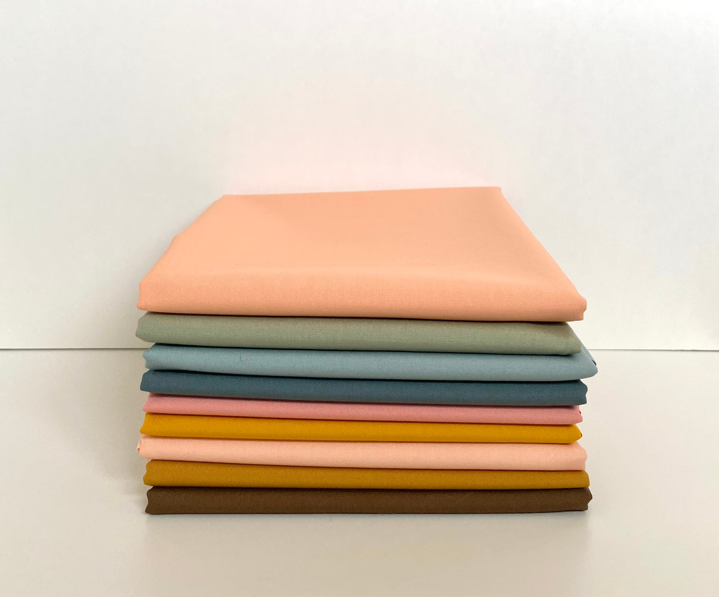 Fabric bundle in half yard pieces sold by Dolly Lou Fabrics. Art Gallery pure solids