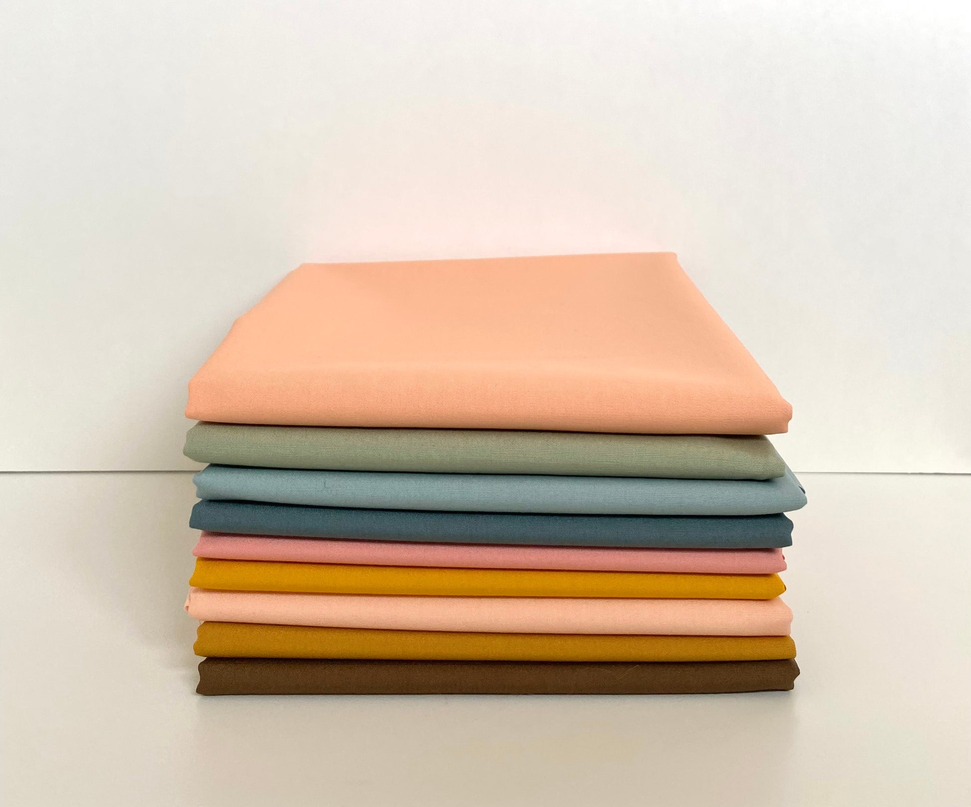Fabric bundle in half yard pieces sold by Dolly Lou Fabrics. Art Gallery pure solids