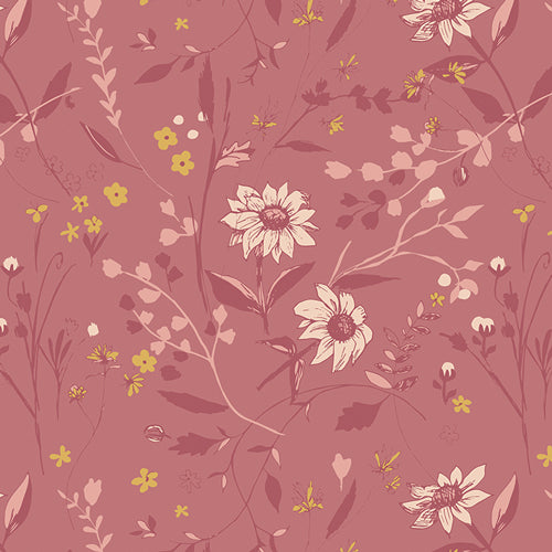 Fabric used for quilting sold by Dolly Lou Fabrics. Patterned with flowers in pink and yellow.