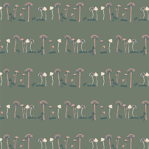 Fabric used for quilting, patterned with mushrooms in green and cream. Sold by Dolly Lou Fabrics.