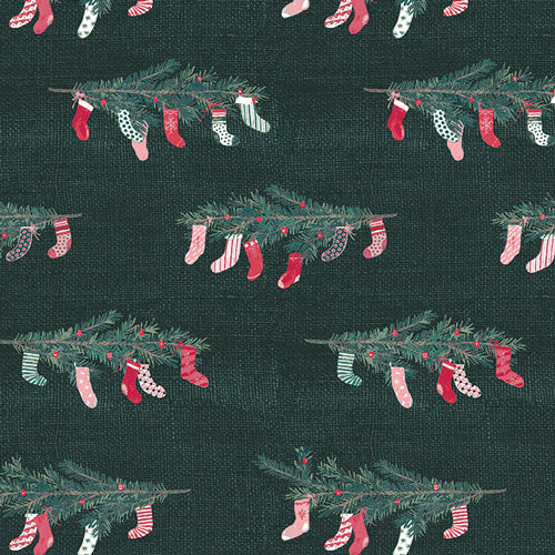Quilting cotton in Christmas print with stockings hung on branches