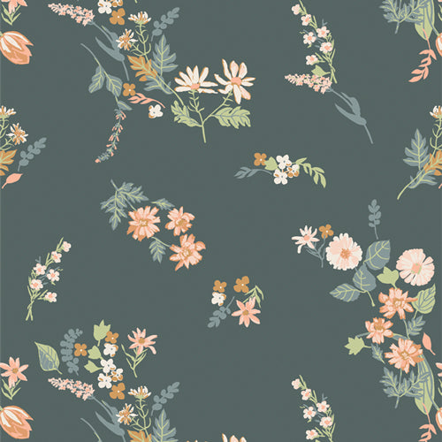 Fabric used for quilting, sold by Dolly Lou Fabrics. Patterned with flowers in green and pink