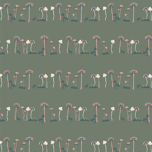 Fabric used for quilting, patterned with mushrooms in green and cream. Sold by Dolly Lou Fabrics.